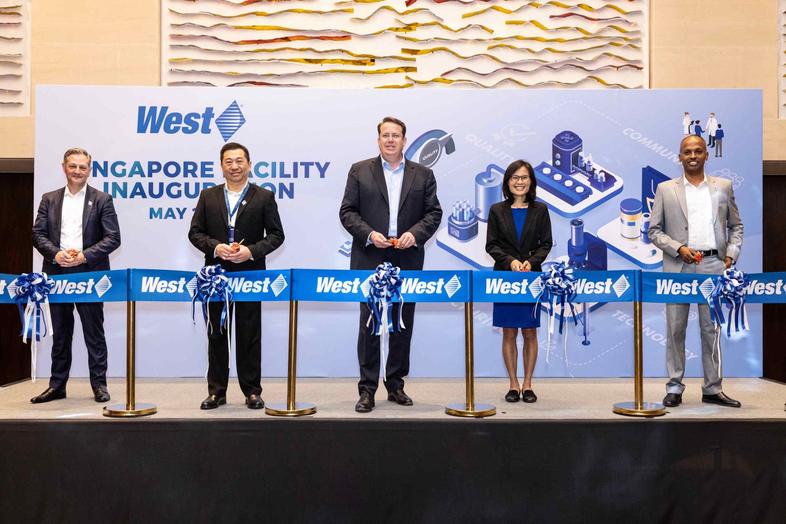 From Left to Right: Bernard Birkett, Senior Vice President, Chief Financial and Operations  Officer; Marcus Tang, Senior Director, Operations, Jurong; Eric Green, President, CEO and  Chair of the Board of Directors; Goh Wan Yee, SVP and Head of Healthcare, EDB; and Alagu  Subramaniam, Senior Director, Sales and Commercial Operations, Asia Pacific at the  inauguration ceremony of West's upgraded manufacturing facility in Singapore